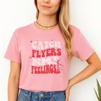 Catch Flyers Not Feelings” Cheer-Inspired Valentine’s Merch